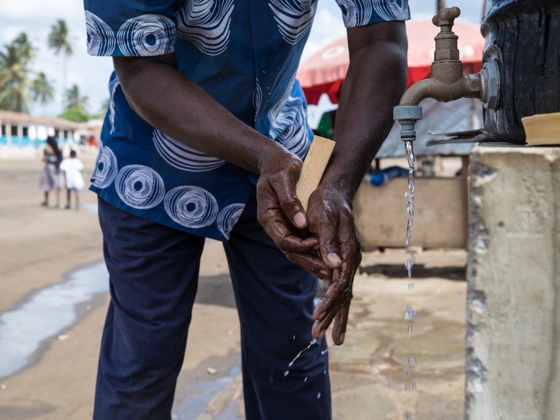 Detail of a person's hands, under water