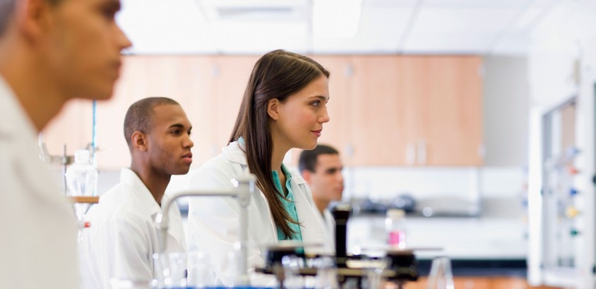 Group of young scientists in the lab during a lecture