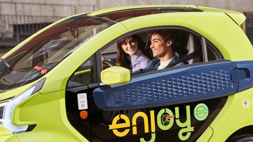  Enjoy XEV car with two boys on board