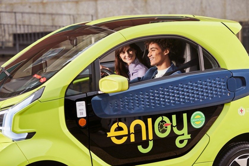  Enjoy XEV car with two boys on board