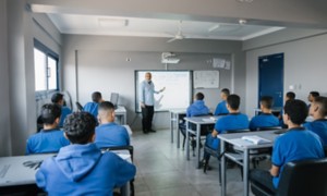 Group of students in class testing technological tools