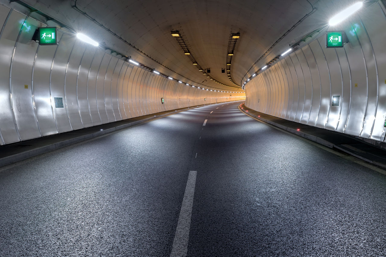 Bend in a road tunnel without traffic