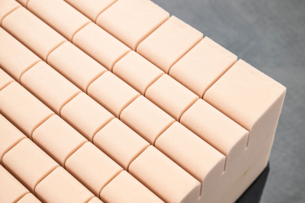 A light peach-colored mattress