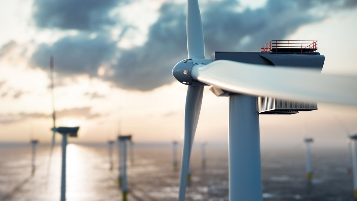 Offshore wind power and energy farm with many wind turbines on the ocean 