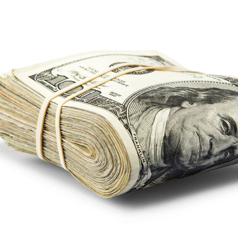 A bundle of one hundred US dollar bills