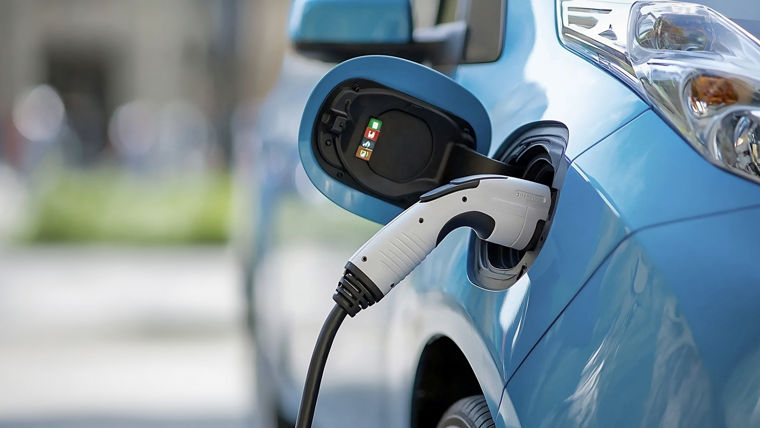 Electric vehicle charging station installed in a rural countryside setting 