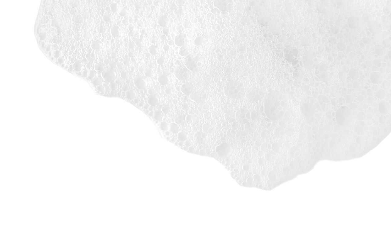 Soap foam on white background