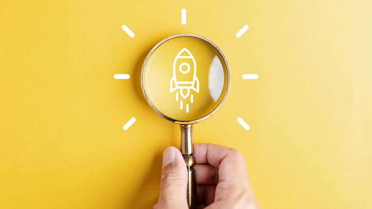 Magnifier glass focus to rocket launch objective with idea creative light bulb icon. planning development leadership and customer target group concept.