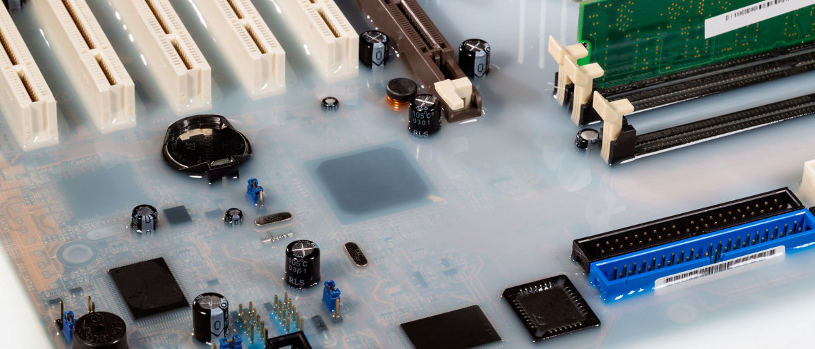 mainboard card personal computer flooded by white colored water