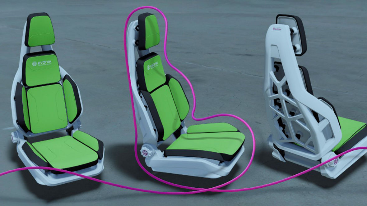 Three automotive seat models with layered green components and lightweight structure, illustrating a monomaterial design for improved recyclability and circular production