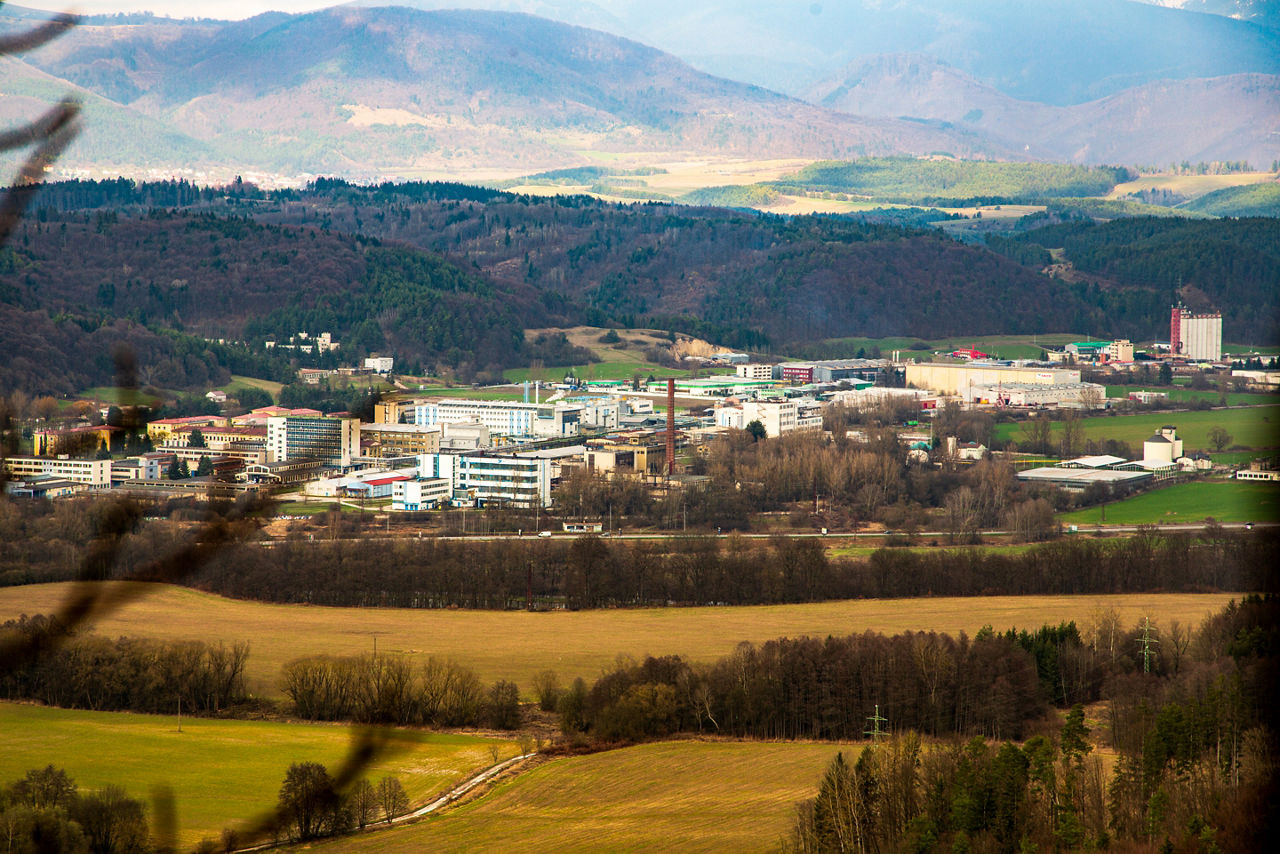Evonik plant in Slovenská Ľupča, Slovakia, with the mountains of the Low Tatras in the background.