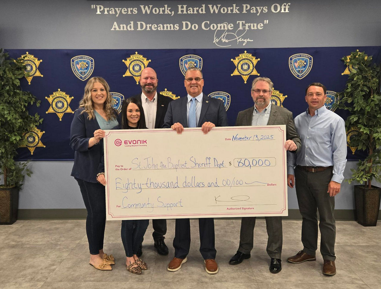 Evonik employees present a check for a $80,000 donation to St. John Parish Sheriff’s Office in Louisiana