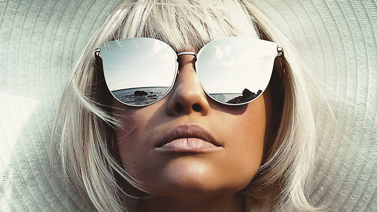Beautiful lady in hat and sunglasses