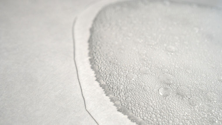 Foam bubbly soap water fragment as a background texture