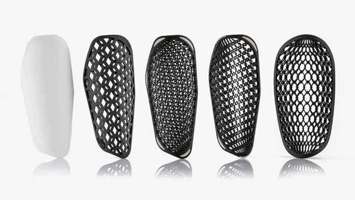 Five 3D-printed protective components with lattice structures made from INFINAM® PA12 powder using Selective Laser Sintering (SLS), showcasing lightweight and durable design.