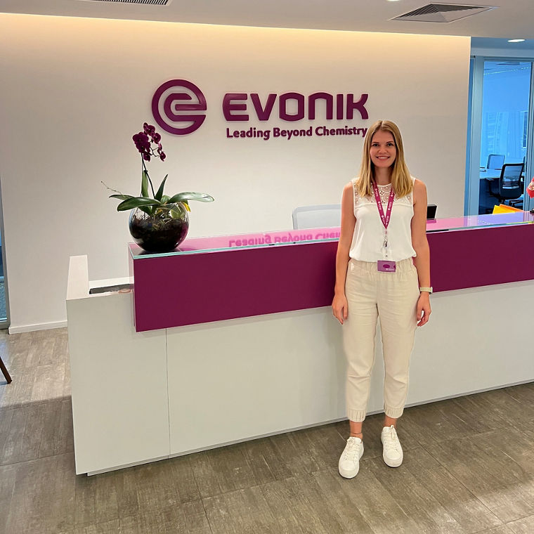 Reception area at Evonik with a logo and a welcoming atmosphere.