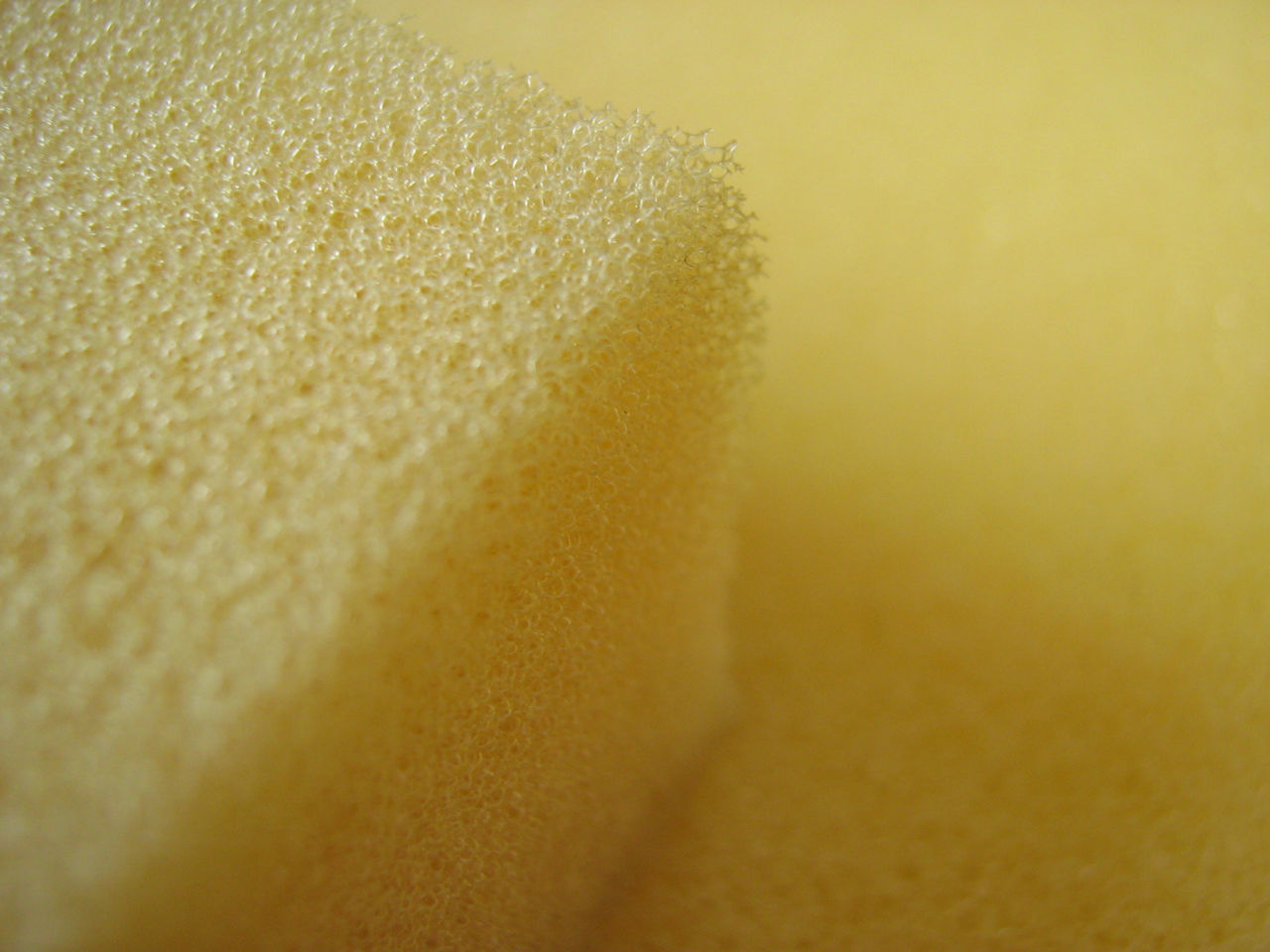 Yellow slabstock polyether foam with porous texture for flexible PU applications