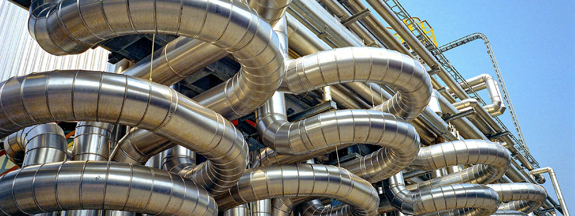 Many curved pipes in a chemical plant.