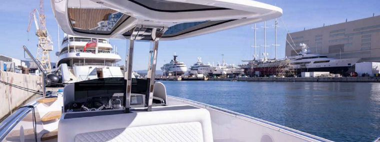 Luxury Motorboat Cockpit with Marina View and Premium Seating Area