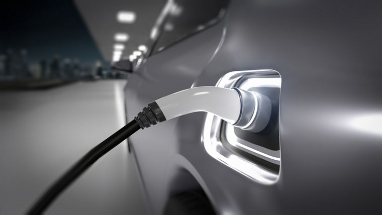 View of a Power supply connect to electric vehicle to charge the battery - 3d rendering