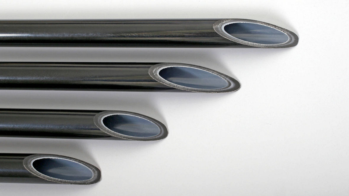 Four black, angled-cut hollow tubes arranged diagonally on a white background.
