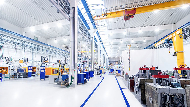 a cable under rack legs at sea blue epoxy floor. (Industrial epoxy floor)