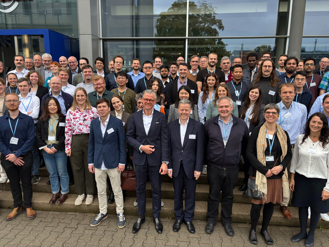 A group photo with around 60 people