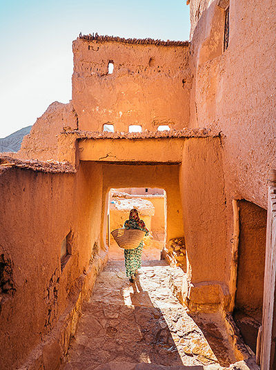 Woman in narrow lane