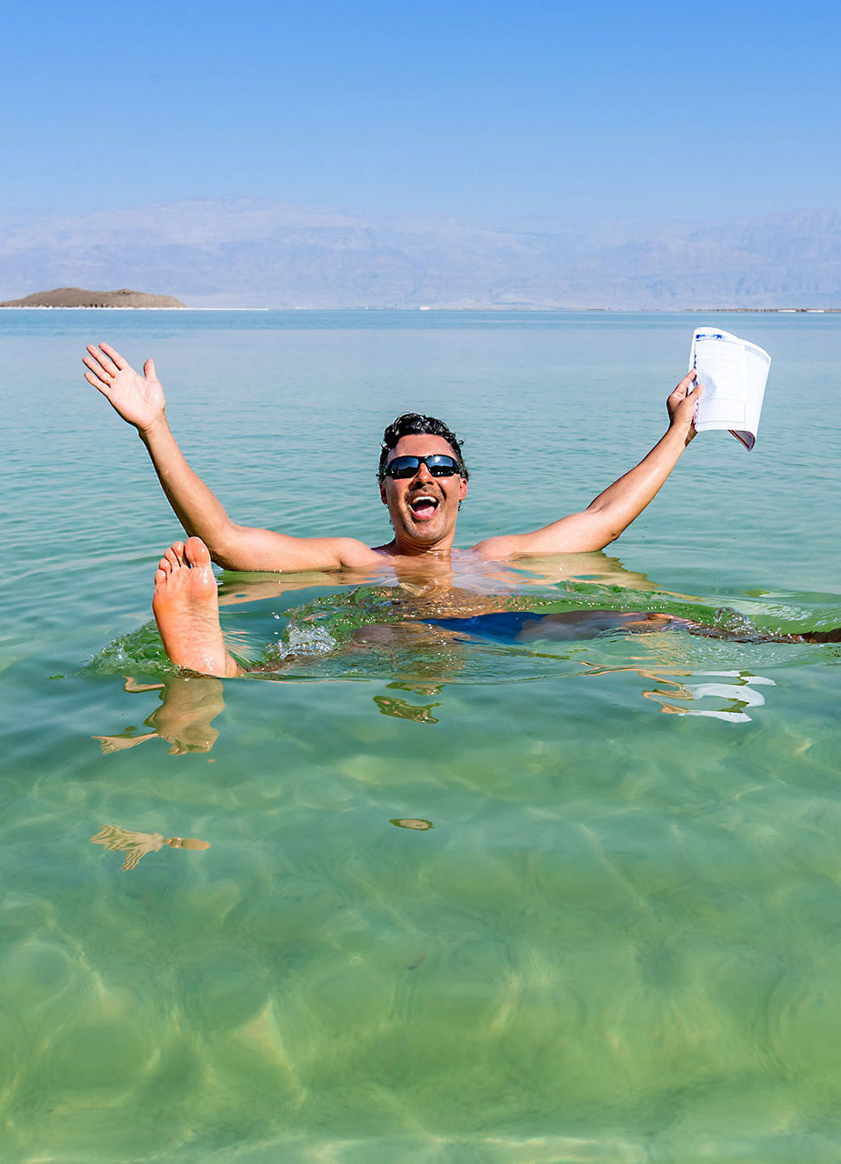 Man floating in Dead Sea