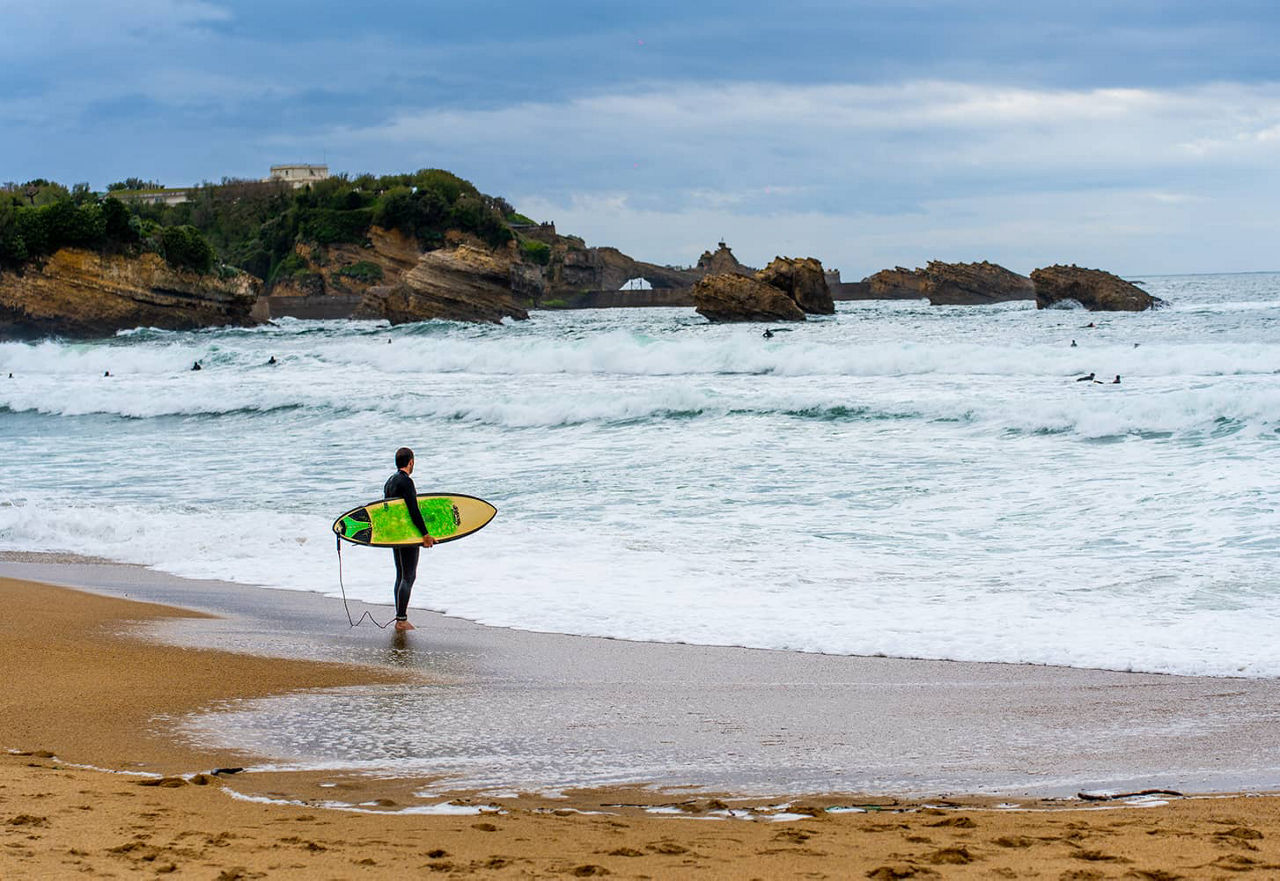 Surfer at Biarritz beach