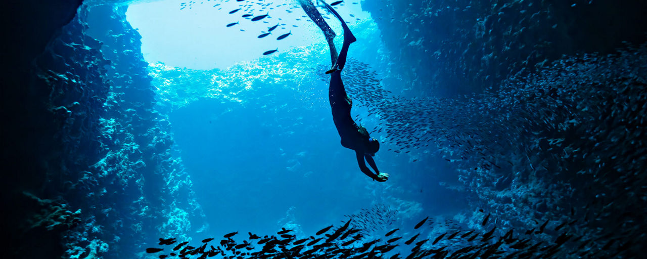 Diver in an underwater cave near Madeira