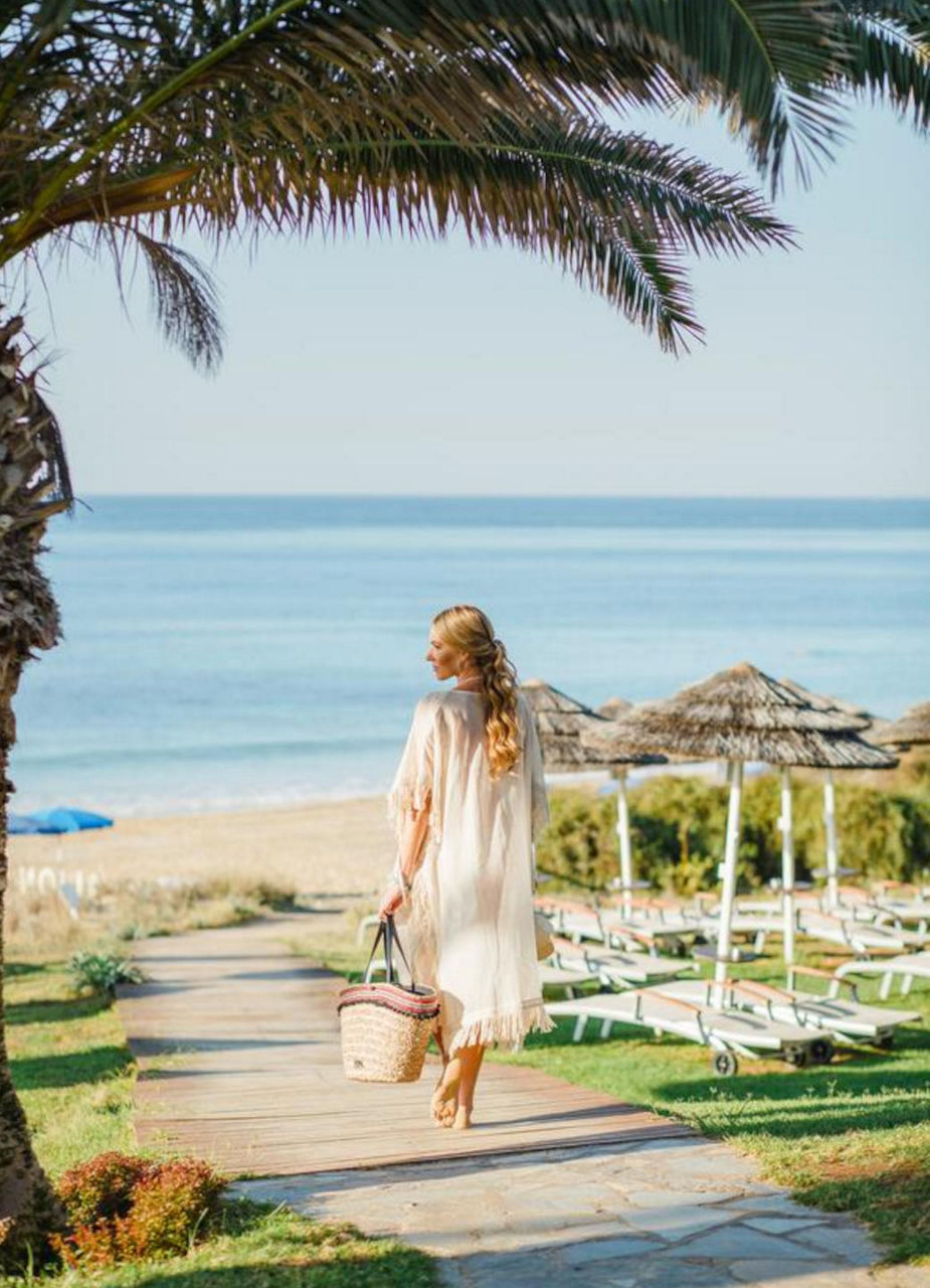 Woman walking To Beach