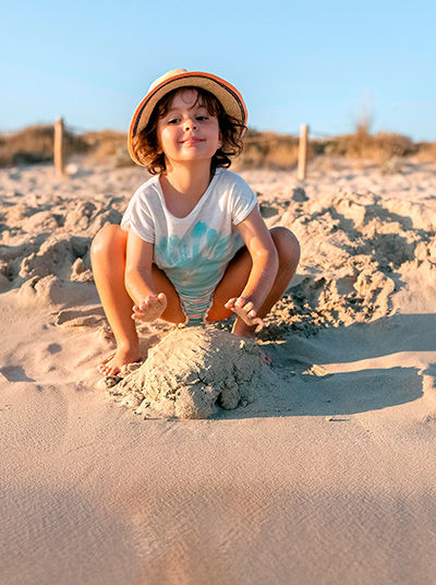 Kid Playing in Sand