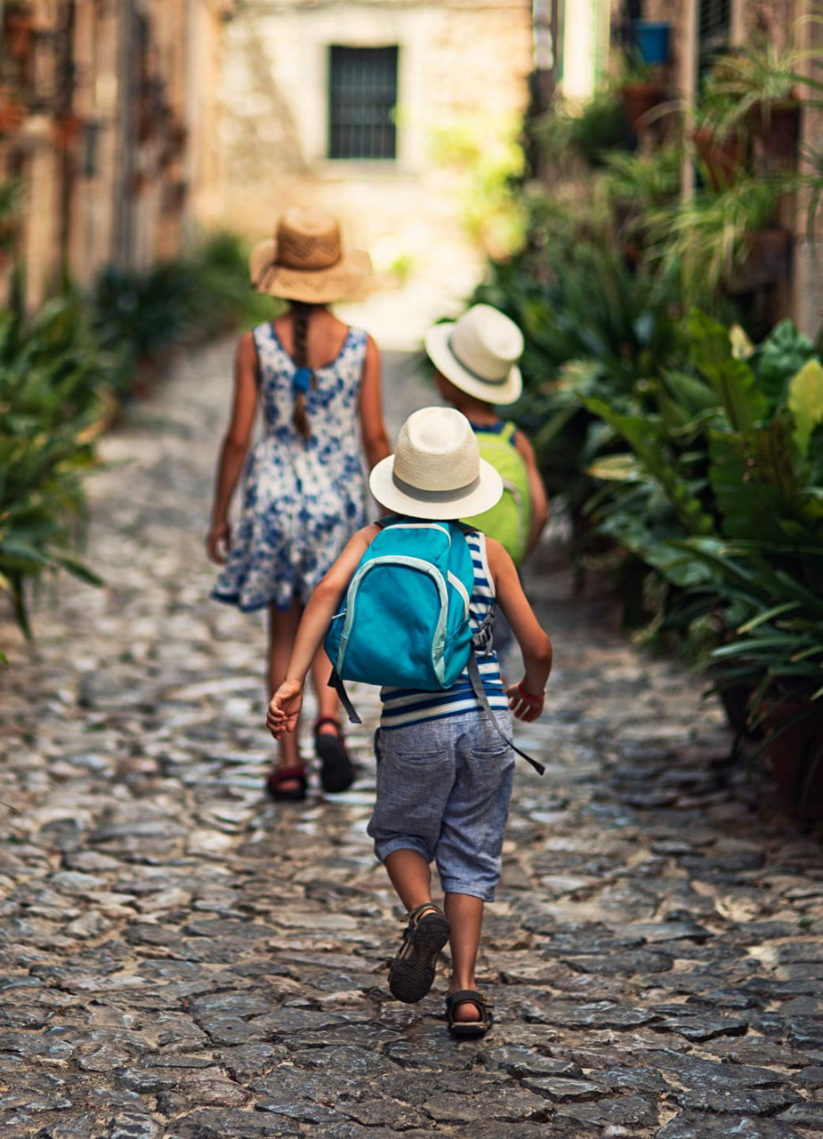 Kids running through streets