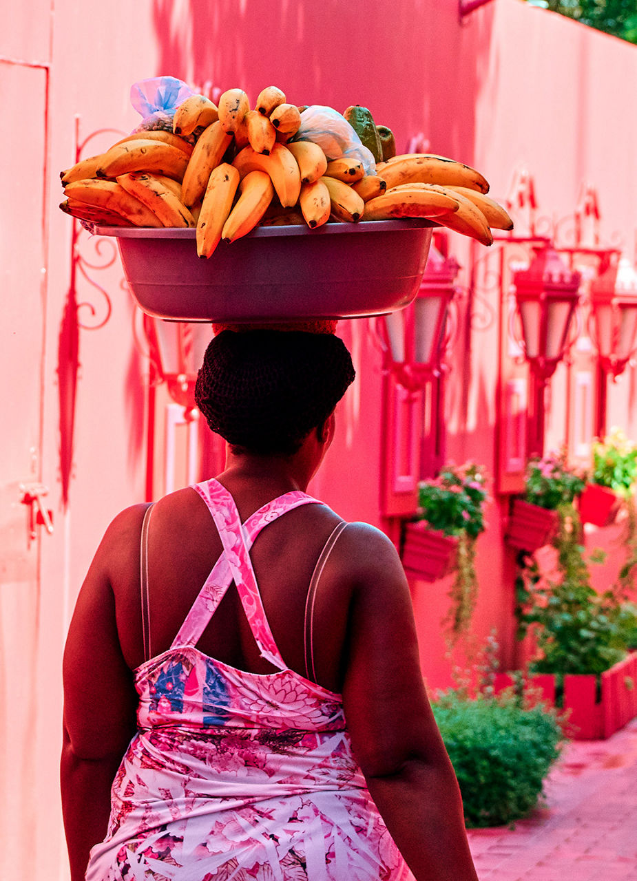 Lady Carrying Fruits
