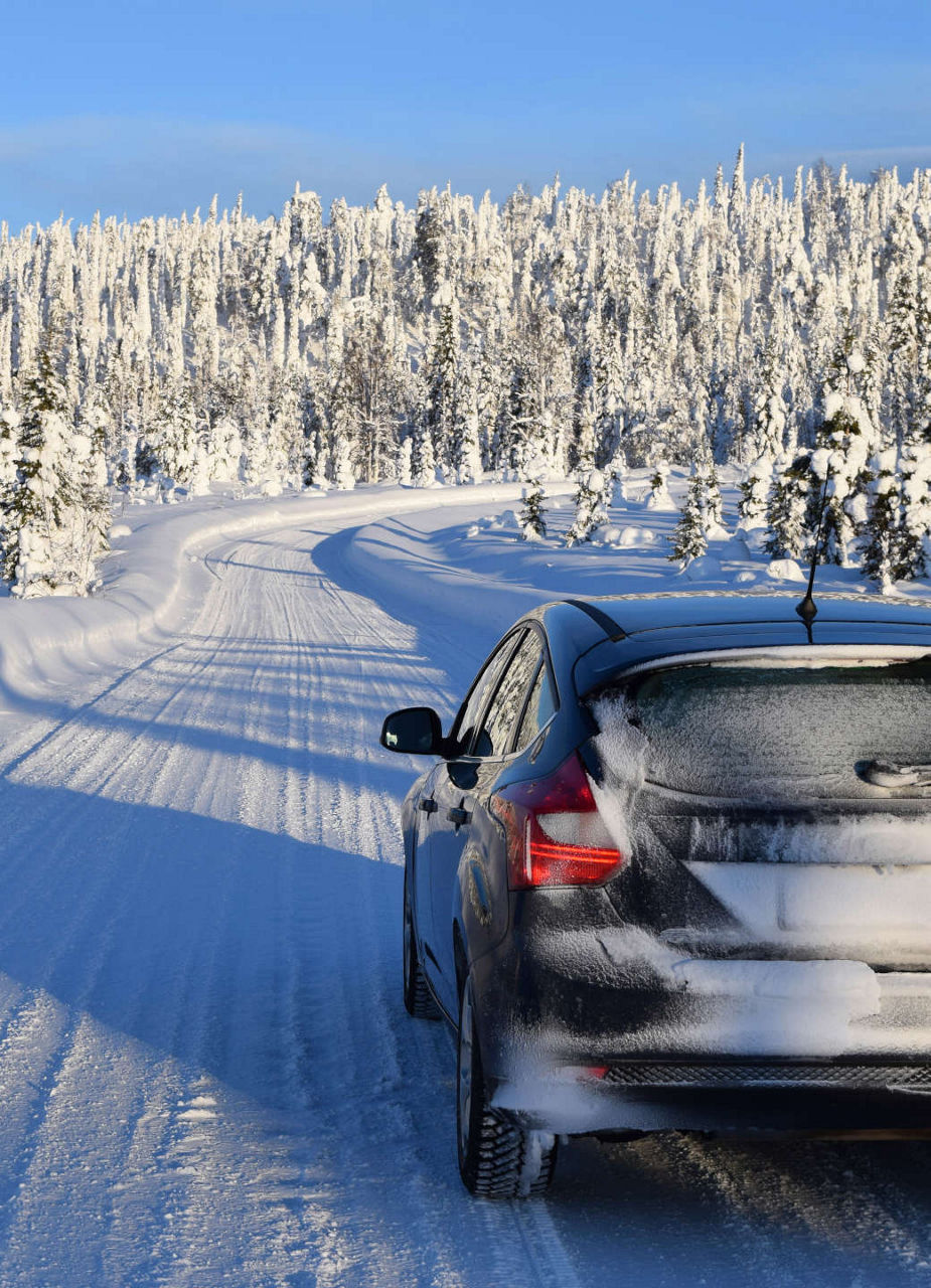 Car driving in snow