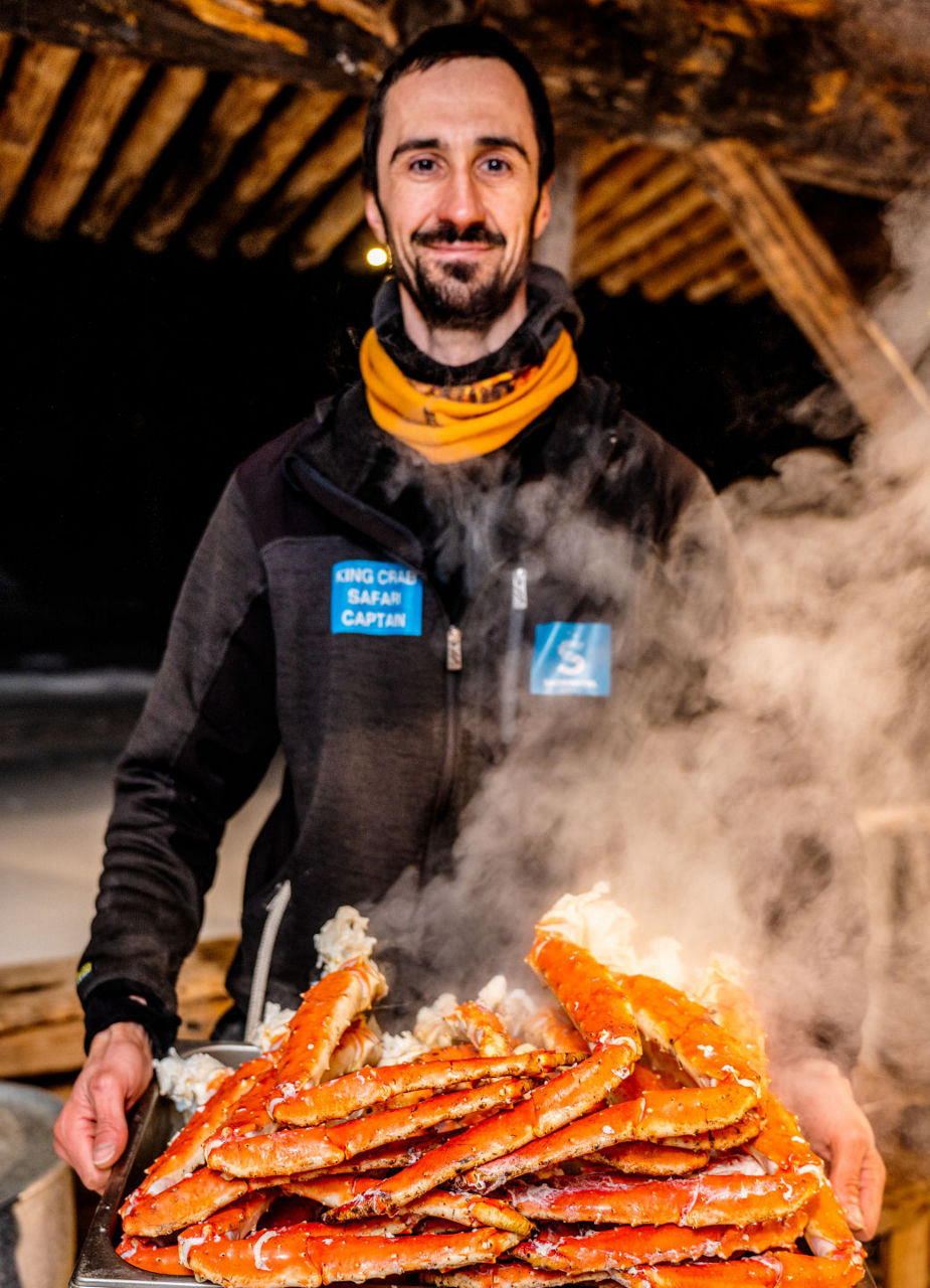 Man cooking king crab