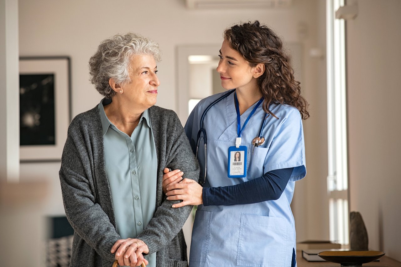 patient smiling with nurse