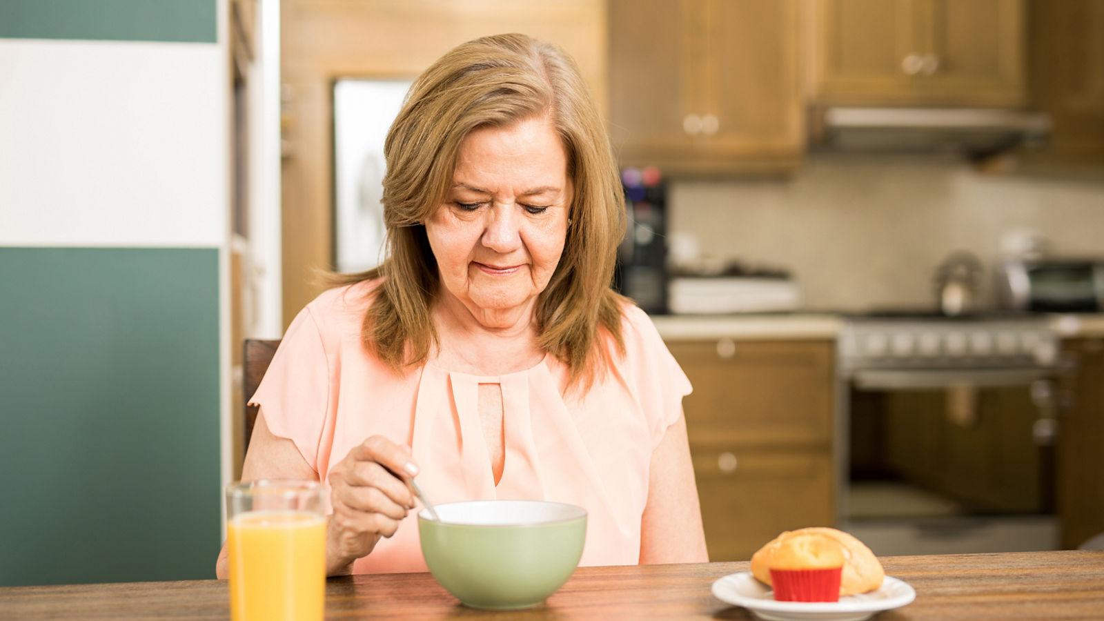 Senior adult woman forced to eat 