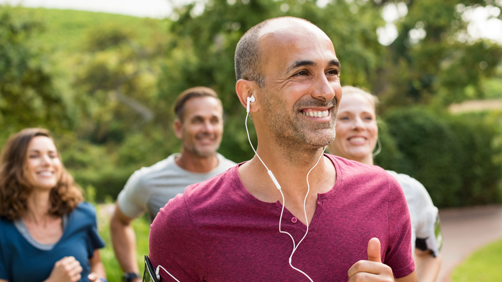 Happy people running