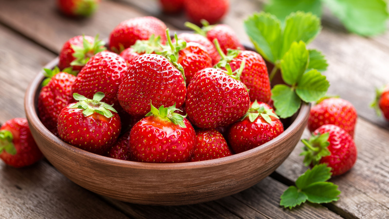 Fresh juicy strawberries with leaves. Strawberry.