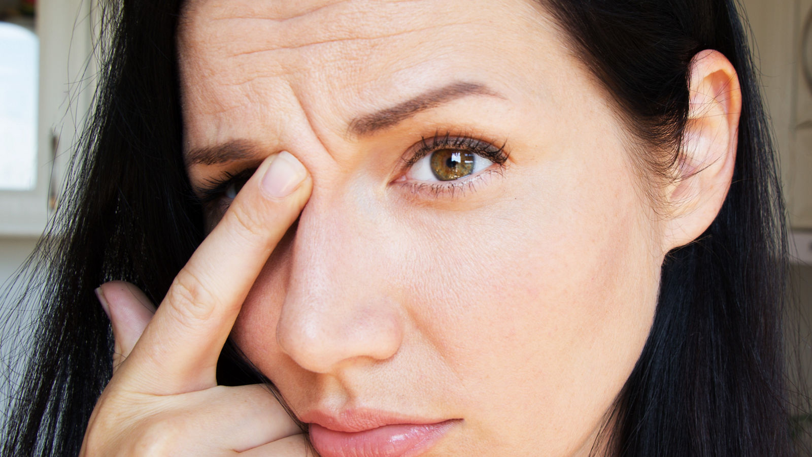 thirty years. Wrinkles on the forehead. Face plastic. 