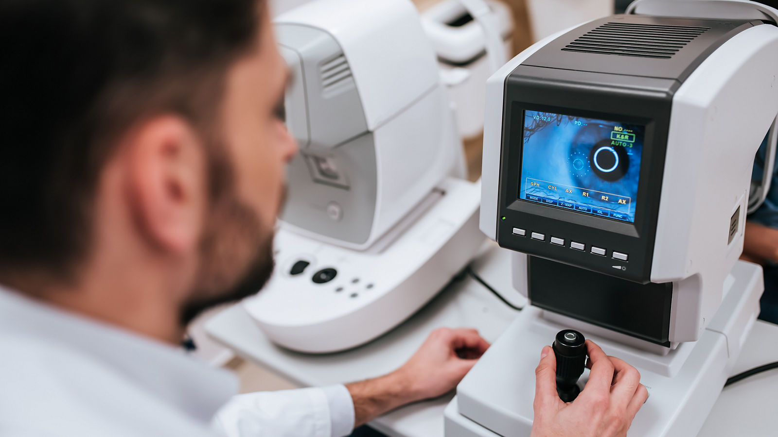 Doctor and patient in ophthalmology clinic