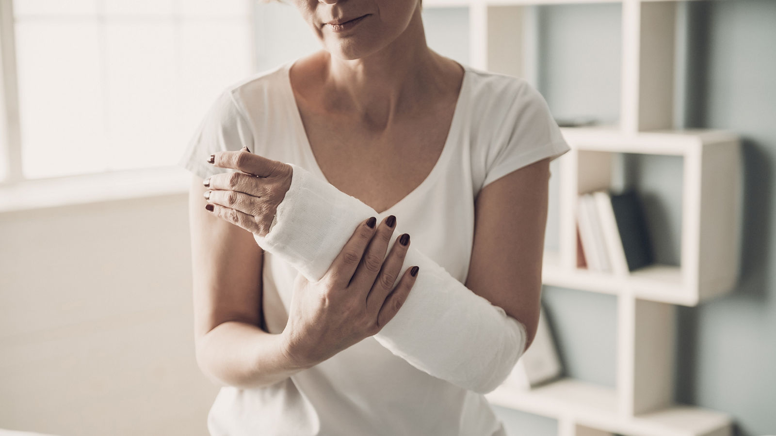 6193048 Close-up of Female Broken Arm in Plaster Cast