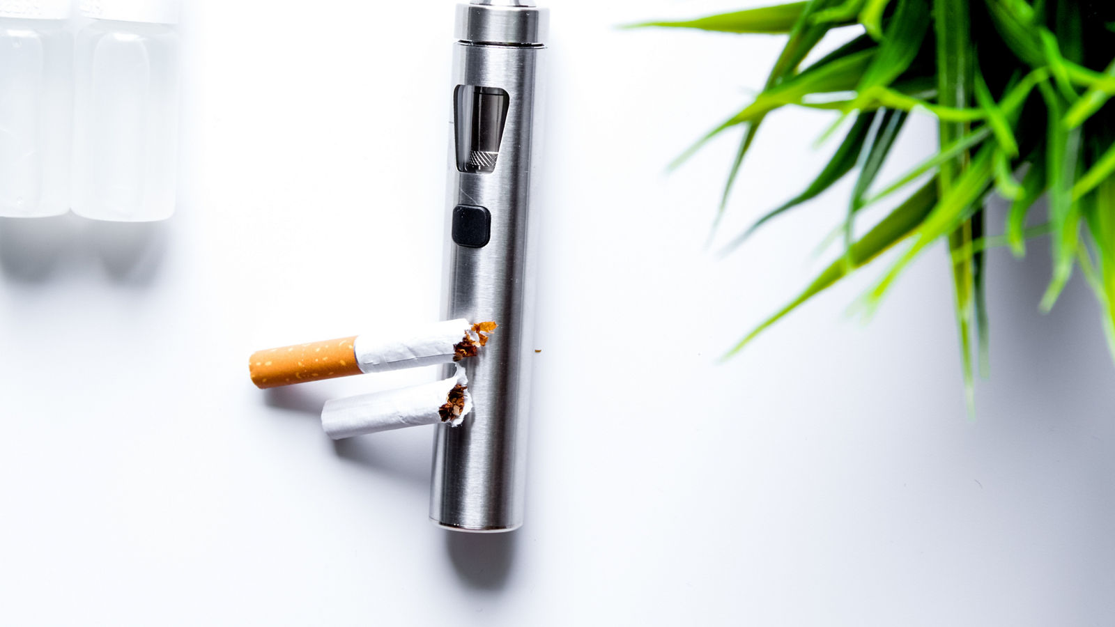 concept of electronic cigarette on white background top view