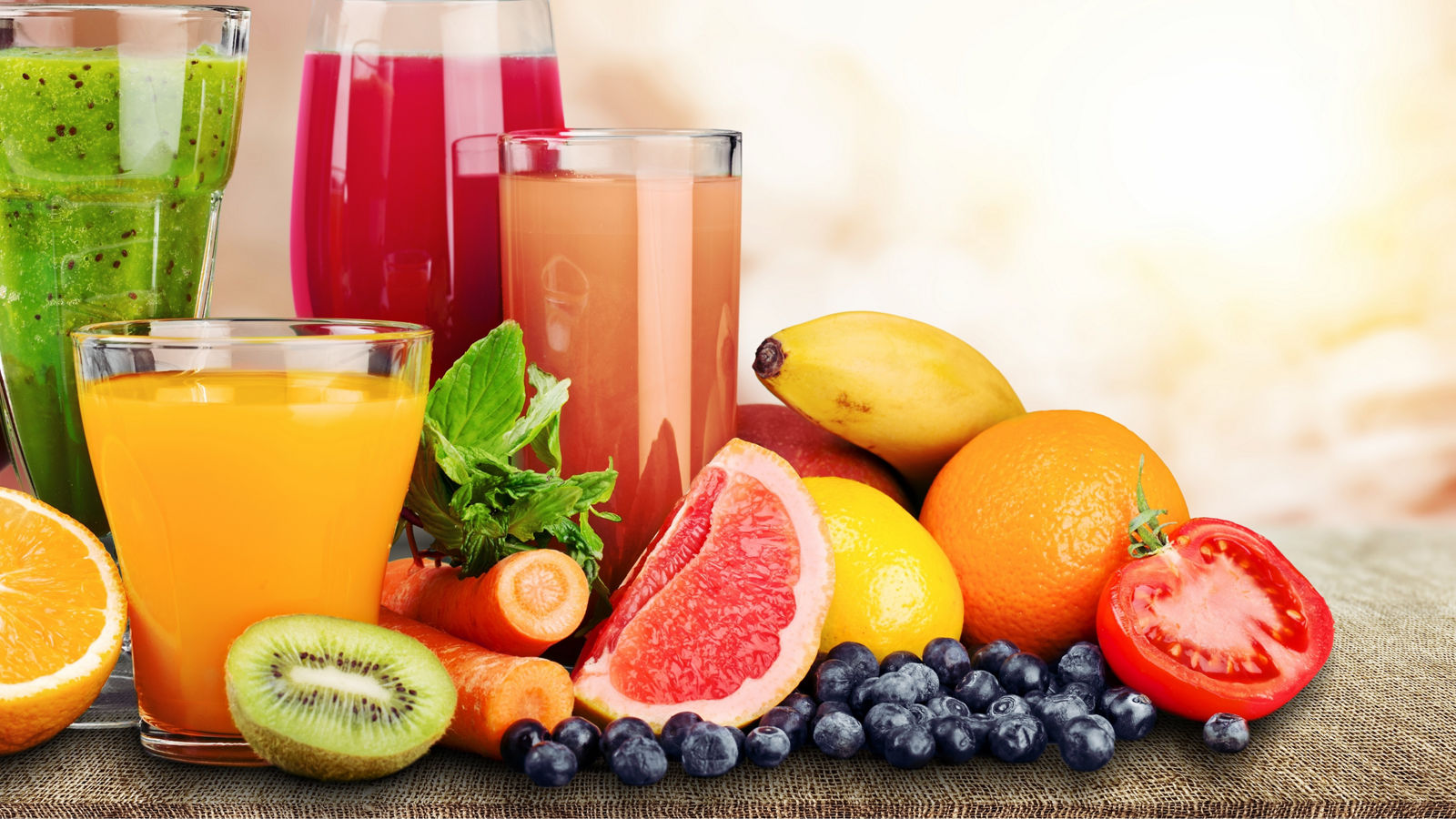 Composition of fruits and glasses of juice