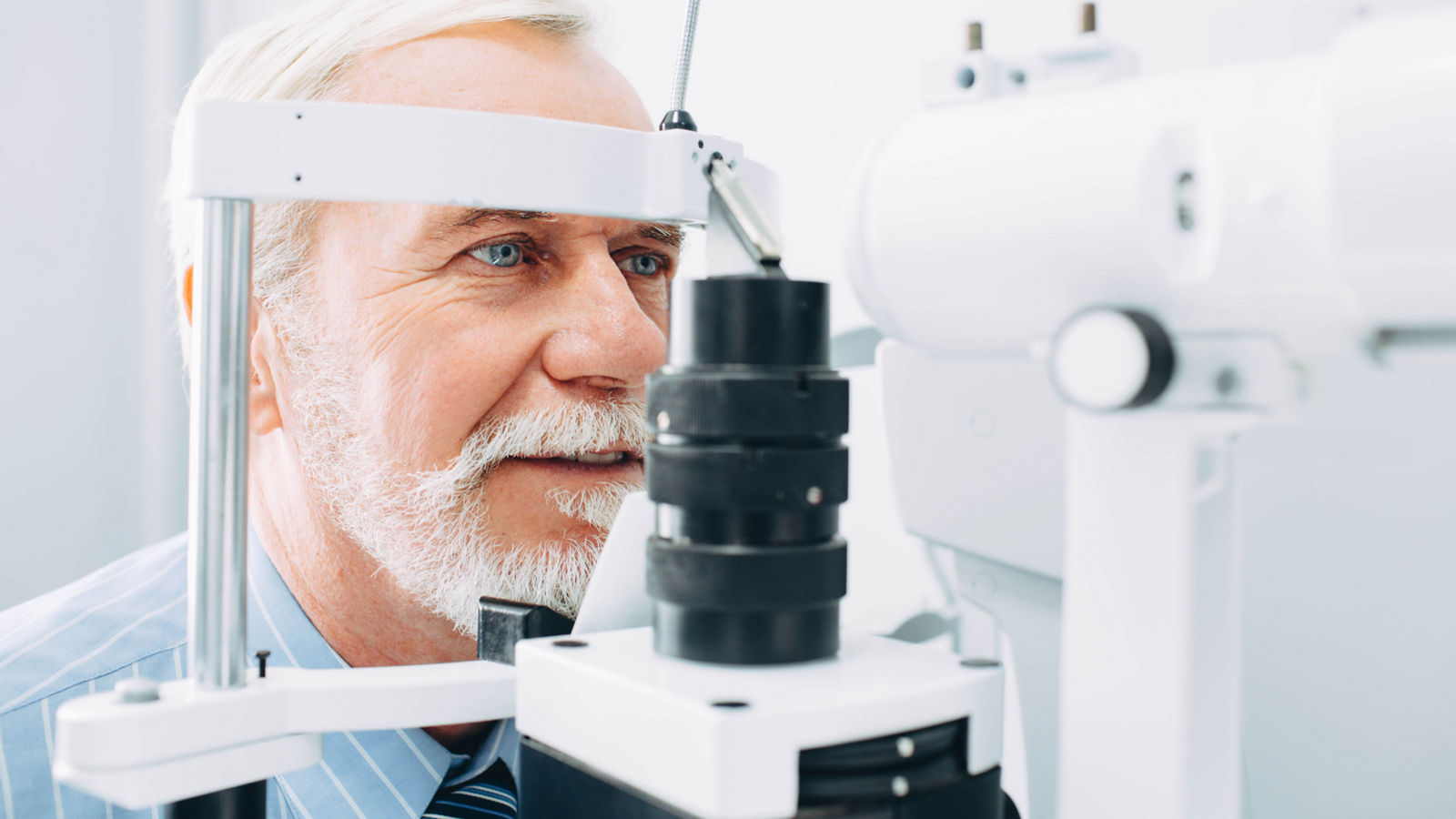 Senior patient receiving eye exam at clinic, eyesight examination aged people,Senior patient receiving eye exam at clinic, eyesight examinatio