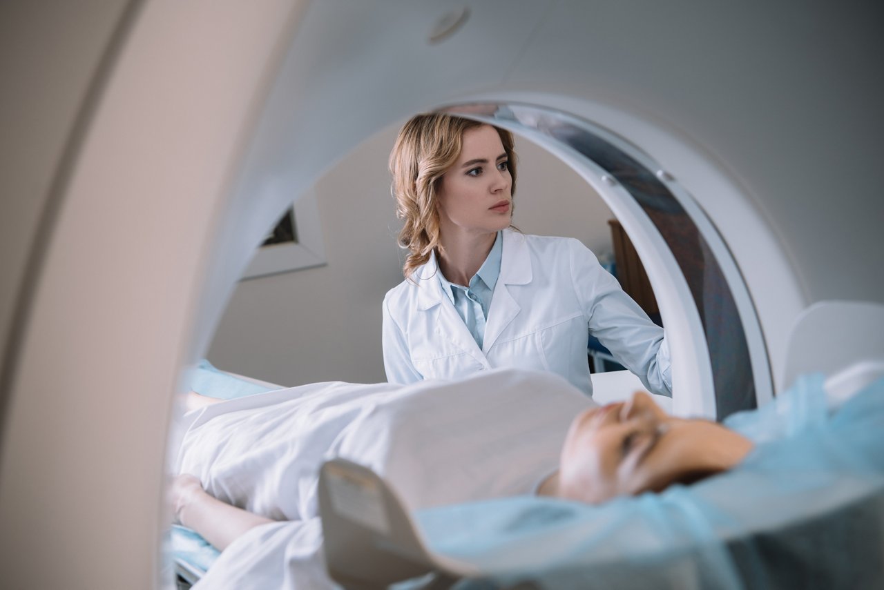 selective focus of attentive radiologist operating mri machine during patients diagnostics