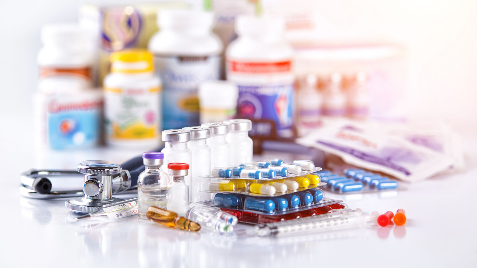 Drug prescription for treatment medication. Pharmaceutical medicament, cure in container for health. Pharmacy theme, capsule pills with medicine antibiotic in packages.