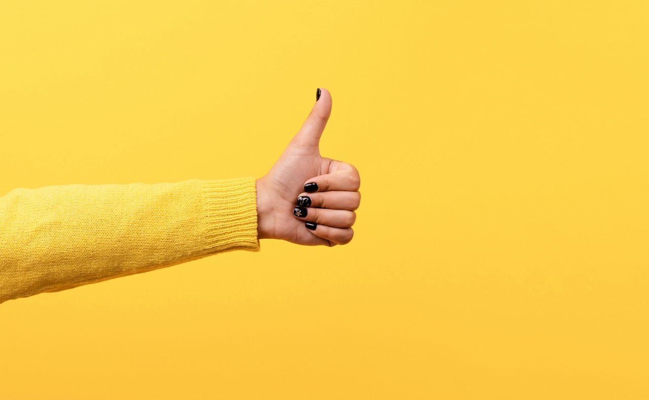 thumb up, like sign  over trend yellow background, panoramic image